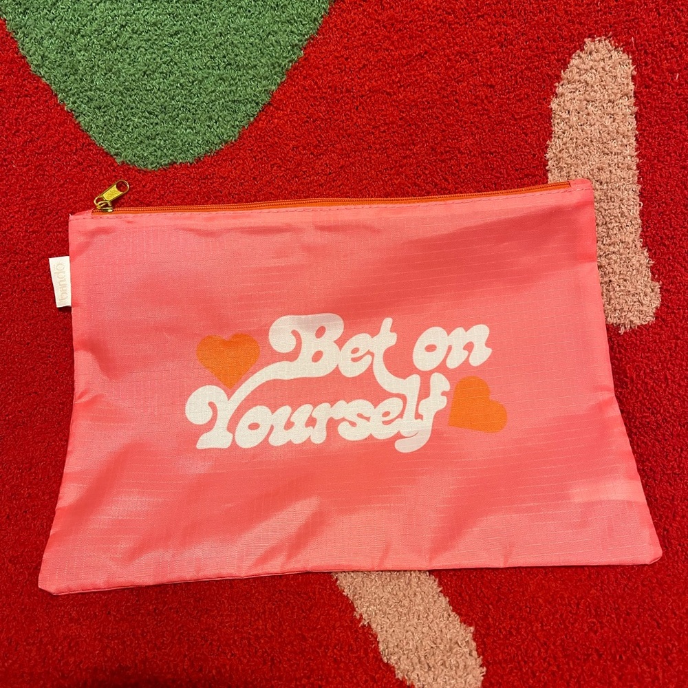 Bando pink nylon pouch